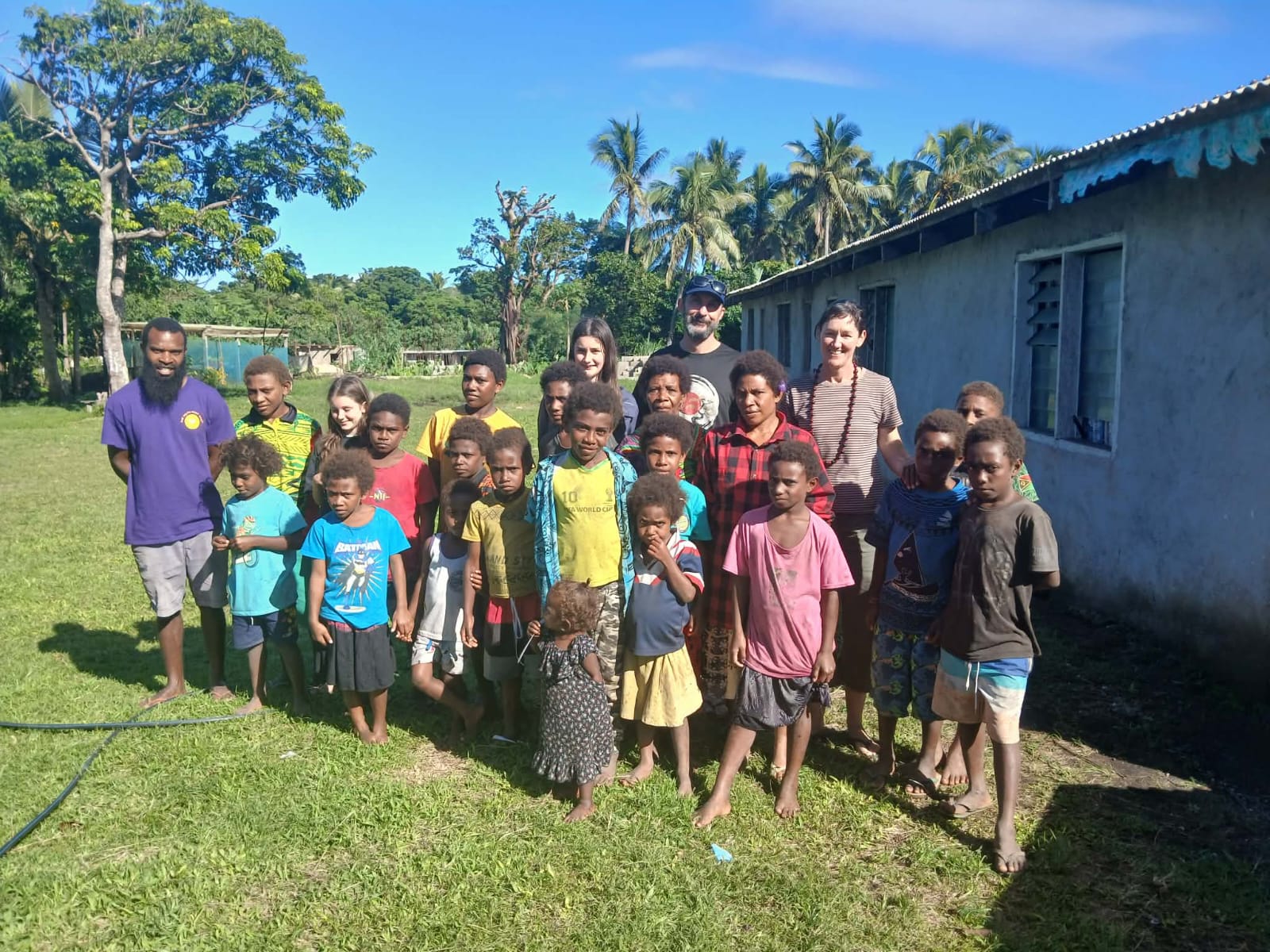 Children, community members and visiting guests