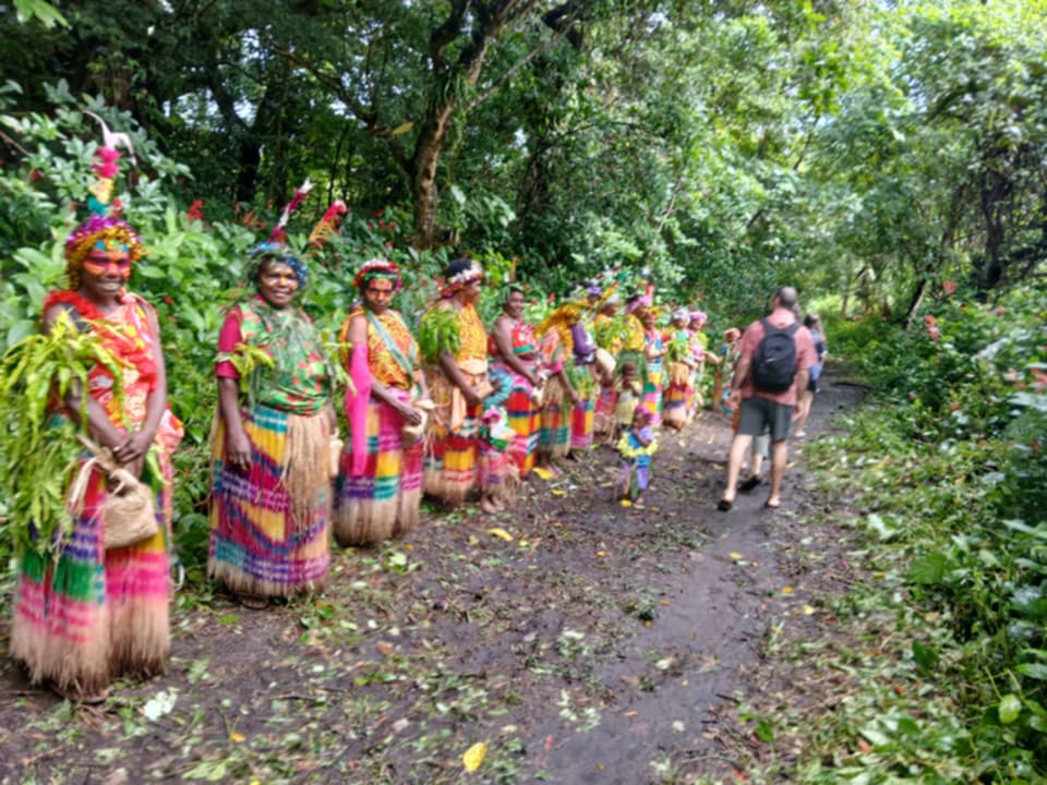 Women offering a traditional welcome